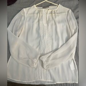 Sheer ivory banana republic top; gold accents.